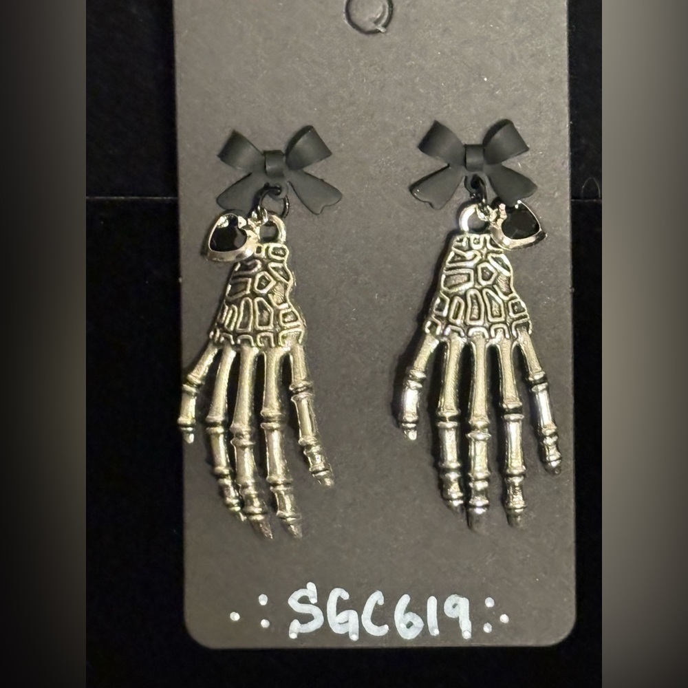Skeleton Hand Earrings with Black Bow Accents
